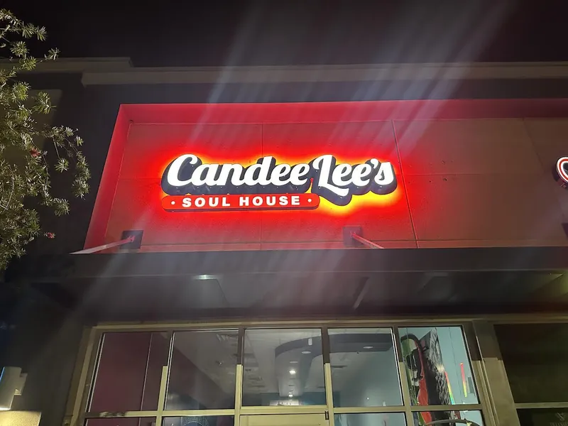 Custom halo lit backer sign with illuminated channel letters by Quality Signs Florida